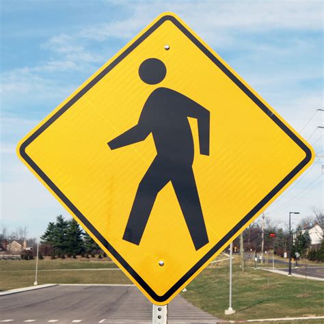 describes  pedestrian crossing sign shown