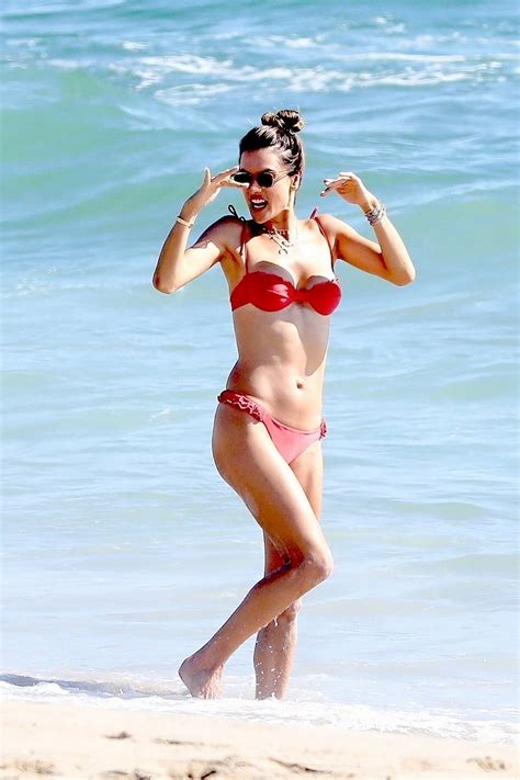 Alessandra Ambrosio In A Micro Bikini On The Beach With A Busty