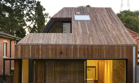 timber clad cut  roof house  sydney puts  modern spin
