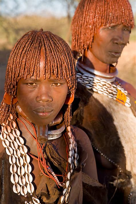 Portrait Of Two Hamer Women With Goscha Ochre And Resin Hair Tresses