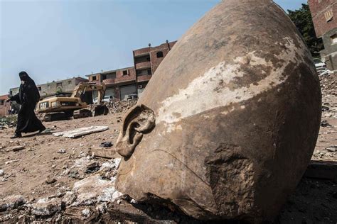 egypt archaeologists discover massive statue in cairo slum