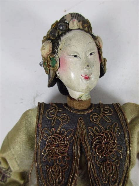 Antique Chinese Wood Painted Doll With Hand Made Silk Robe With