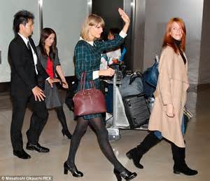 taylor swift in mini dress and chunky heels in japan daily mail online