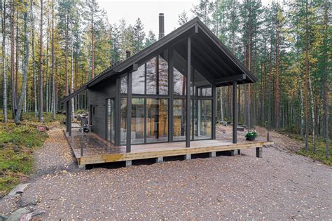 photo      log cabin kit home pops    edge   lake  southern finland