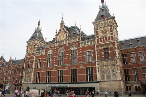 visiting amsterdam netherlands accommodation transport food attractions