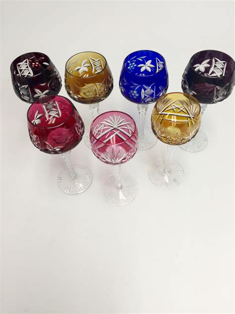set of 7 polish colored cut crystal wine glasses never been used