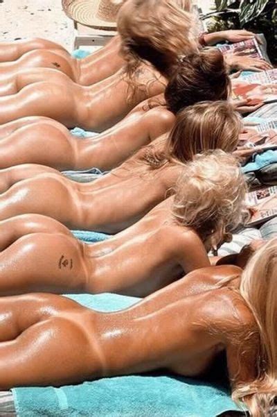 A Long Line Of Bare Oiled Asses Beach Babes