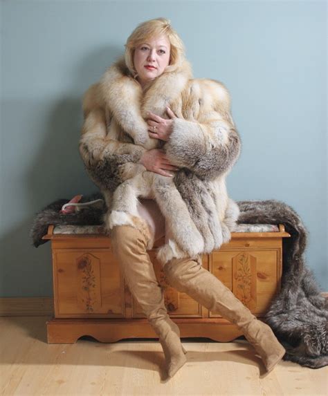 amateur blonde milf in fur coat and boots medium quality porn pic a