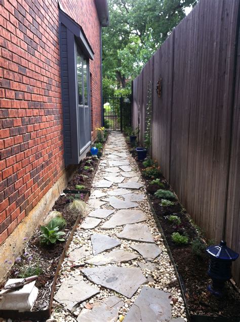 planted  straight  narrow walkway   sunny south facing side yard  north central