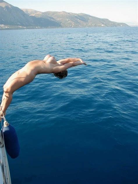 naked backdive off the boat nudeshots