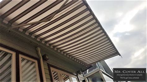 retractable awnings  automated patio awning    enjoy  outdoors