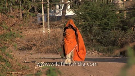 rajasthani woman veiled with her saree walks down deserted village near pushkar youtube
