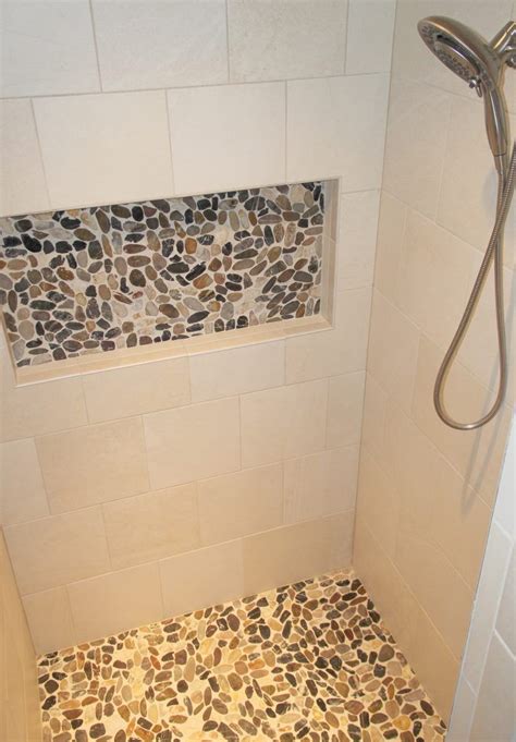 Porcelain Tile Cream Shower Walls With Accent Pebble Niche And Shower