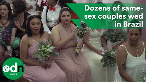 dozens of same sex couples wed in brazil youtube