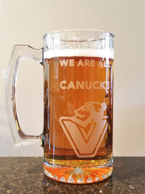 custom engraved glass beer mug with canucks logo star