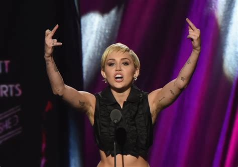 miley cyrus long armpit hair raises eyebrows entertainment news