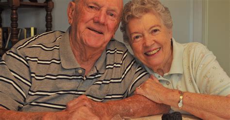 couple eats 60 year old wedding cake on anniversary