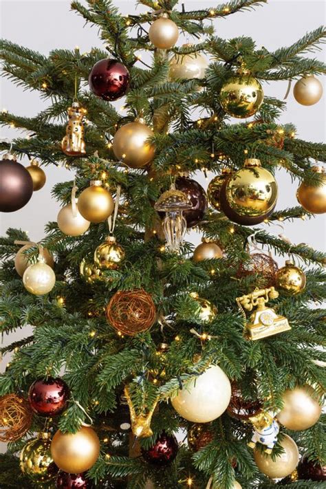 versierde kerstboom goudbrons service puur gemak urbanbloom