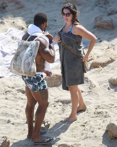 kelly brook turns heads in blue bikini on mykonos beach