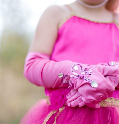 dark pink princess gloves with sequins over the rainbow