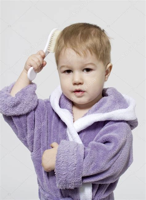 boy brushing  hair stock photo  vikulin