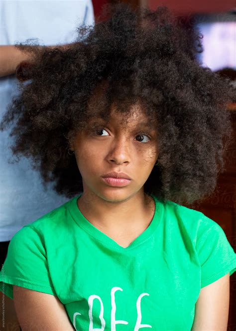 Teen Getting Her Curly Hair Combed By Anya Brewley Schultheiss