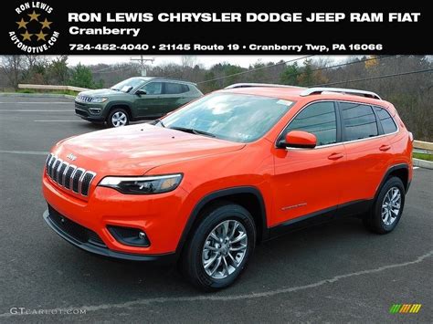 spitfire orange jeep cherokee latitude lux   photo