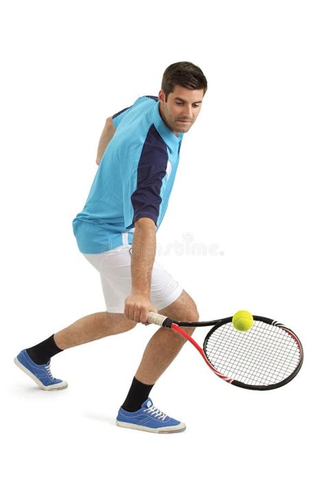male tennis player hitting  ball stock photo image  leisure