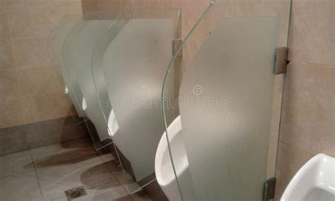 Urinals With Privacy Walls In A Public Men`s Toilet Stock Image Image