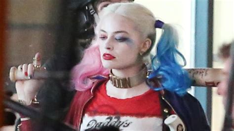 margot robbie transforms into harley quinn in suicide squad