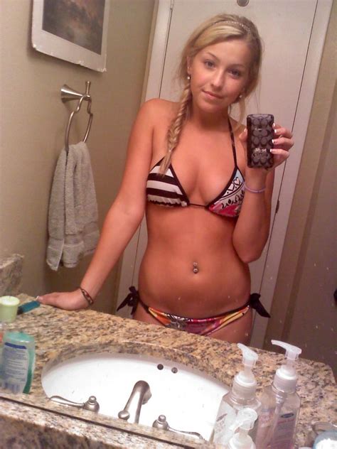 cute amateur blonde selfie in bathroom redbust