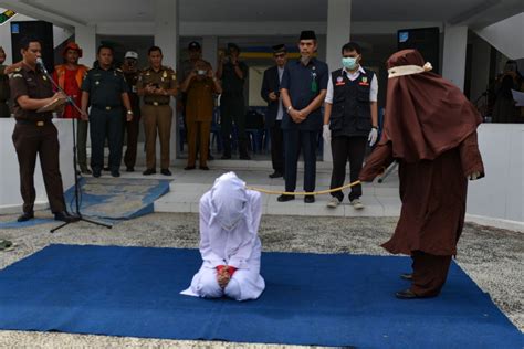 indonesia s aceh hires female floggers to whip women for