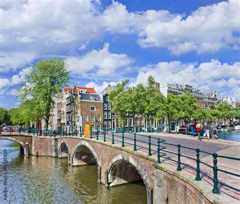 amsterdam canal belt  ancient bridges  step gabled mansions amsterdam netherlands stock
