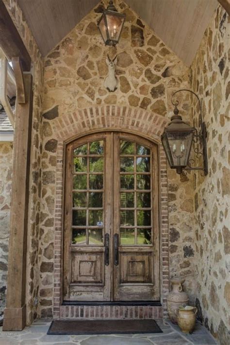 rustic front door  rustic french door exterior stone floors glass
