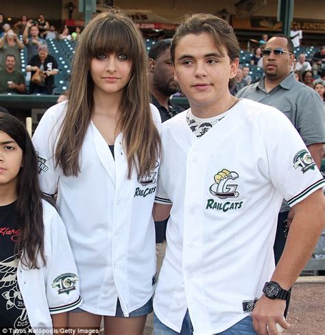prince jackson shops with his girlfriend as it is claimed he feuded with sister paris before