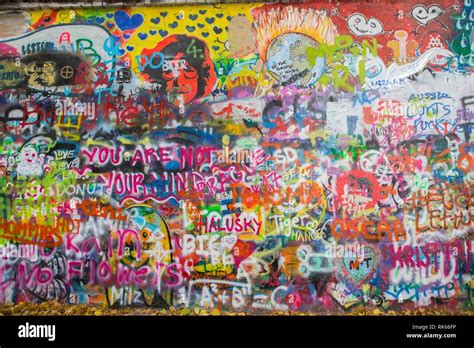 Lennon Wall Or John Lennon Wall With Colorful Grafitti In Prague Czech