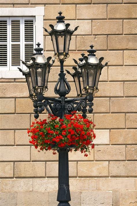 flowers  lamp post barcelona spain stock image image  barcelona architecture