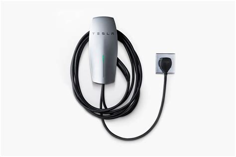 tesla launches    home charging station