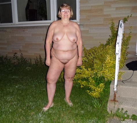 topless saggy granny outdoors