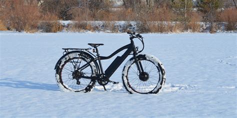electric snow cycling dual motor  bike electrek