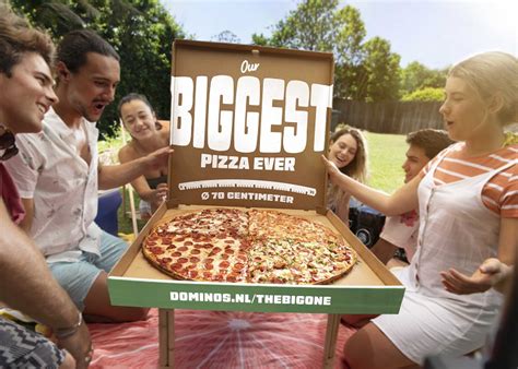 jubilerende dominos brengt de big  pizza atfoodclicks
