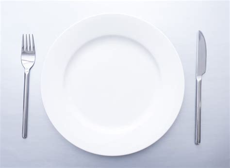plain simple place setting  empty white plate  stock image