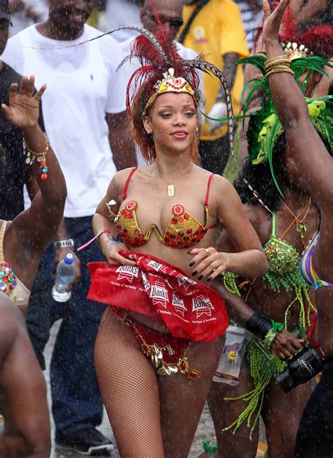 rihanna in slutty outfit getting her boobs groped at barbados kadoome pichunter