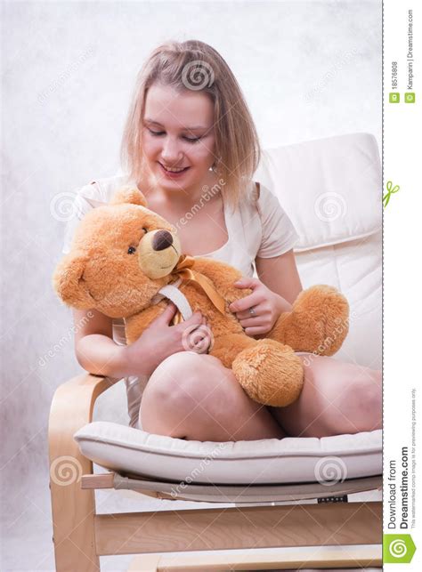 girl  bear stock photo image  blonde smiling