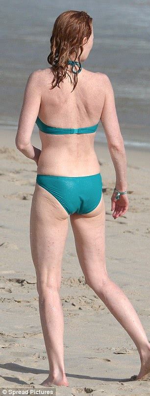 csi s marg helgenberger displays enviable bikini body while soaking up