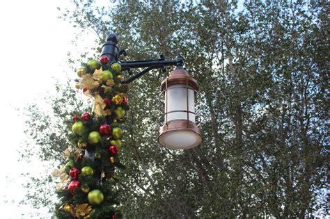 restored historic lanterns installed  lantern village park