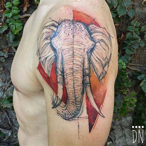 Sketchy Elephant Head Tattoo On The Left Shoulder