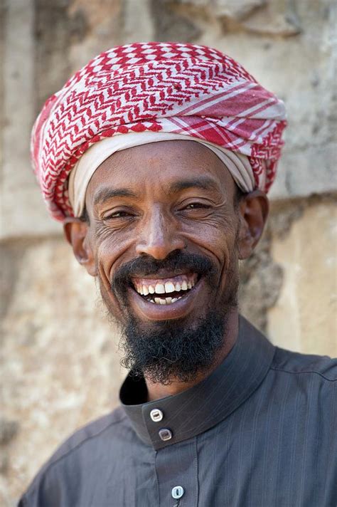 a smiling muslim man in harar photograph by tony camacho fine art america