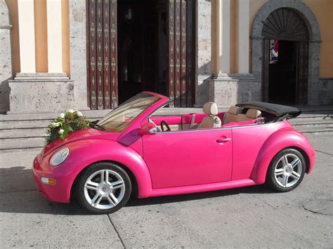 gorgeous pink vw  beetle convertible
