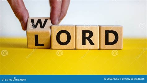 word   lord symbol hand turns  wooden cube